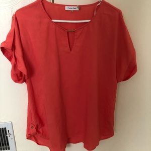 Calvin Klein peach shirt